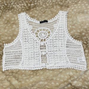 White crocheted swim cover.